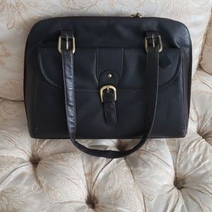 Gently used leather laptop bag.